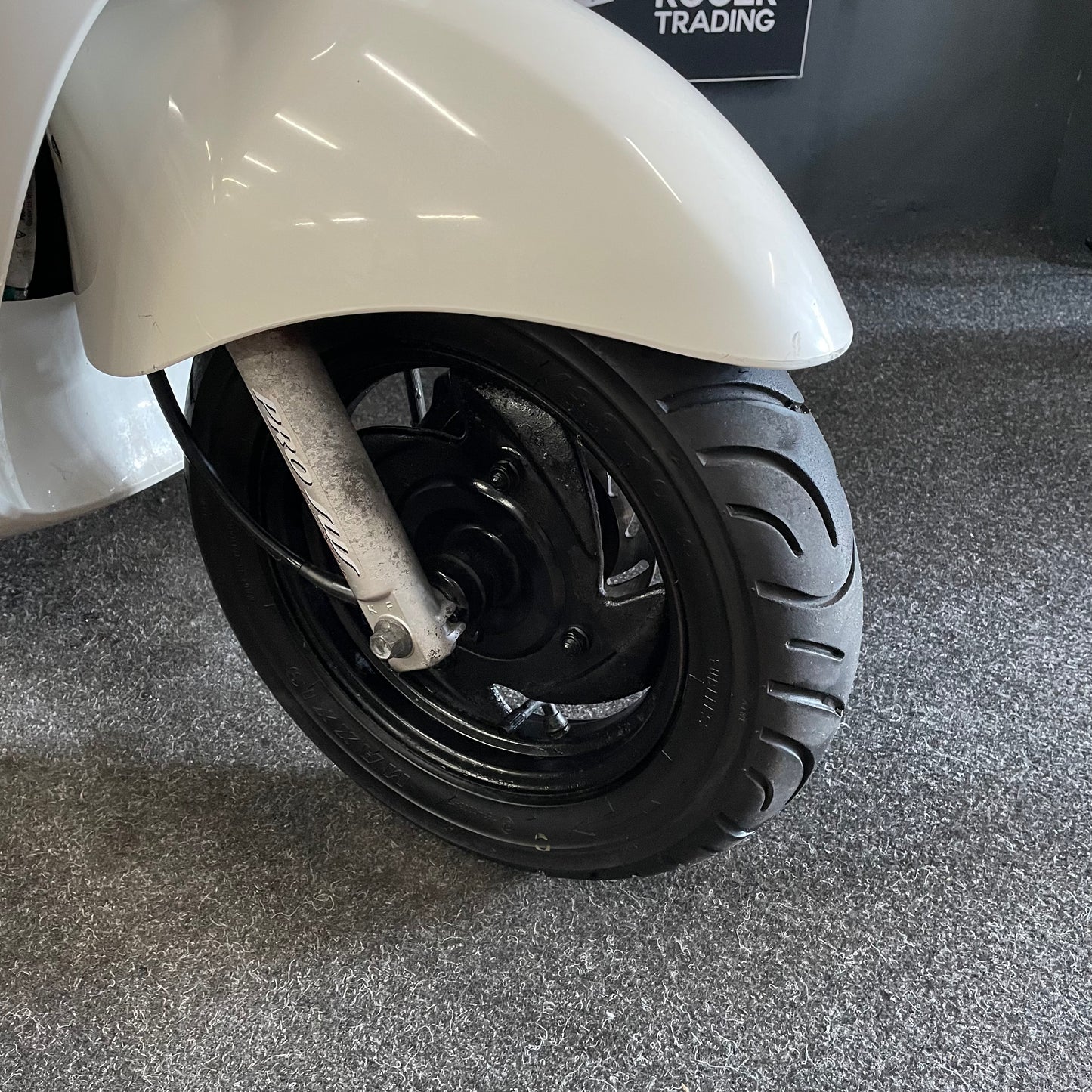 Sym Mio - Snor - 4T 2V - 2010 -  Wit/bruin - 7.238km