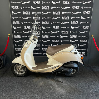Sym Mio - Snor - 4T 2V - 2009 -  Creme - 5.082km - Nieuwstaat!!
