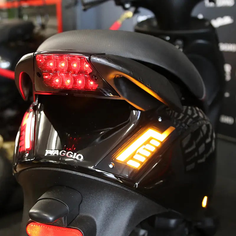Alpha Lightning – LED-Blinker hinten – Rauchglas – Piaggio Zip